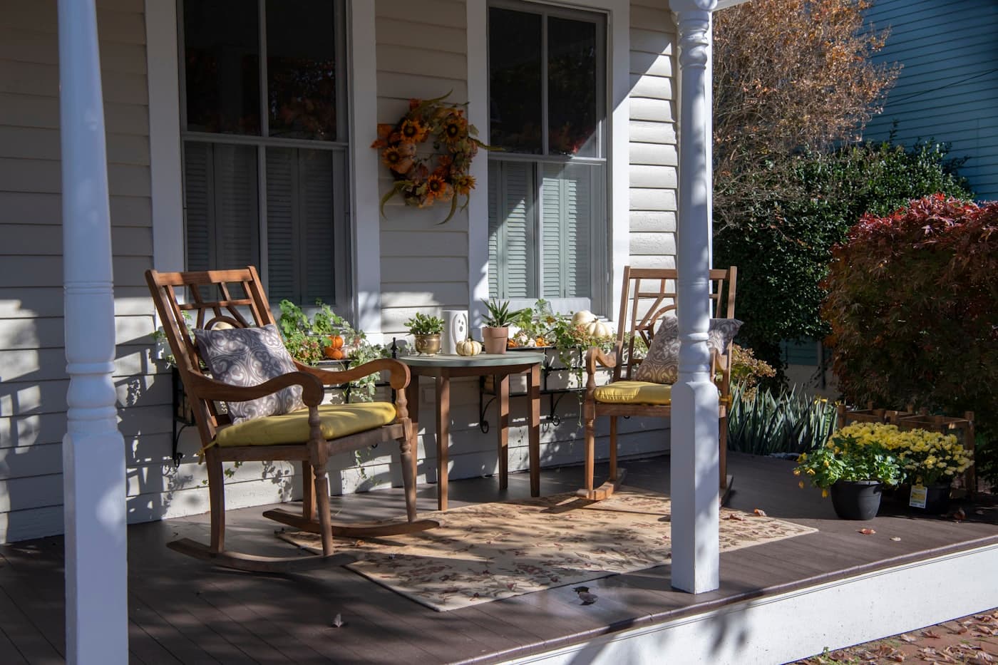 Sunlit front porch of a craftsman-style home